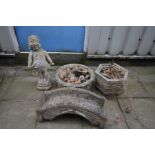 FOUR VARIOUS COMPOSITE GARDEN ITEMS, to include two composite garden planters, a figure of a child
