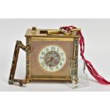 A BRASS AND ENAMELLED CARRIAGE CLOCK, of a square form, round white dial with the centre decorated