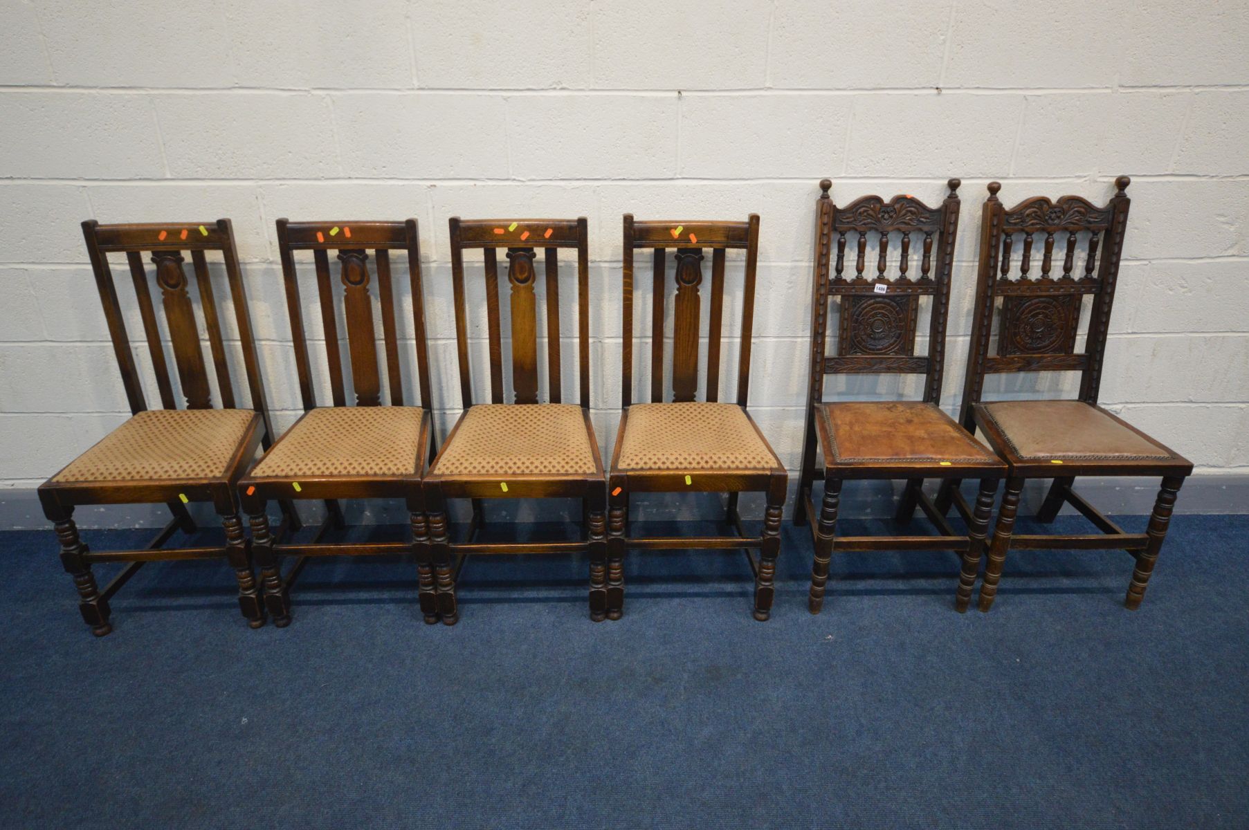 A PAIR OF CARVED OAK HALL CHAIRS, along with a set of four oak dining chair (6)