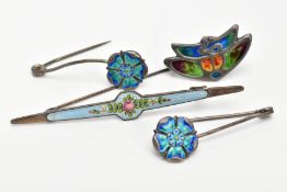 FOUR ARTS AND CRAFTS BROOCHES, to include two 'Pearce & Son' silver brooches, each with a blue and