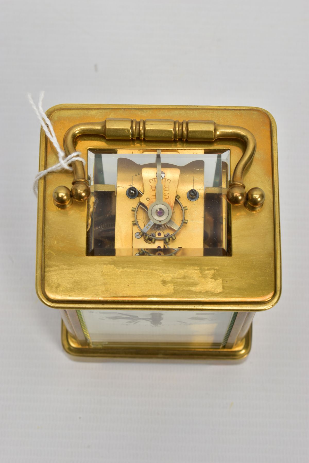 A BRASS CARRIAGE CLOCK, white dial, Roman numerals, blue hands, within a five glass panel - Image 6 of 6