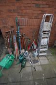 THREE ALUMINIUM STEP LADDERS together with a ladder stand-off, quantity of garden tools to include