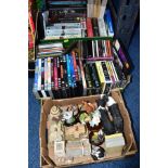 THREE BOXES OF BOOKS, CDS DVDS AND ORNAMENTS, to include three Lilliput Lane ornaments (Clare