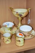 SEVEN PIECES OF ROYAL WORCESTER BLUSH IVORY ITEMS, all pieces printed and tinted with floral sprays,