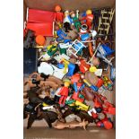 A QUANTITY OF UNBOXED AND ASSORTED PLAYMOBIL FIGURES AND ACCESSORIES, to include cowboys and