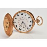 A YELLOW METAL FULL HUNTER POCKET WATCH, round white dial, Roman numerals with an inner dial of