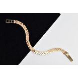 A 9CT GOLD FLAT LINK BRACELET, brick link design, fitted with a fold over clasp, hallmarked 9ct gold