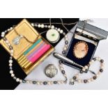A BAG OF ASSORTED ITEMS, to include a cameo brooch of an oval form, depicting a lady in profile,