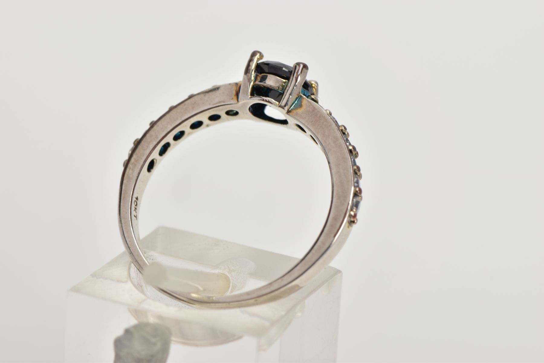 A WHITE METAL CUBIC ZIRCONIA DRESS RING, designed with a central circular cut black stone assessed - Image 3 of 4