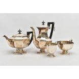 A GEORGE V FOUR PIECE SILVER TEA SERVICE SET, comprising of a teapot and a coffee jug each fitted