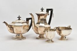 A GEORGE V FOUR PIECE SILVER TEA SERVICE SET, comprising of a teapot and a coffee jug each fitted