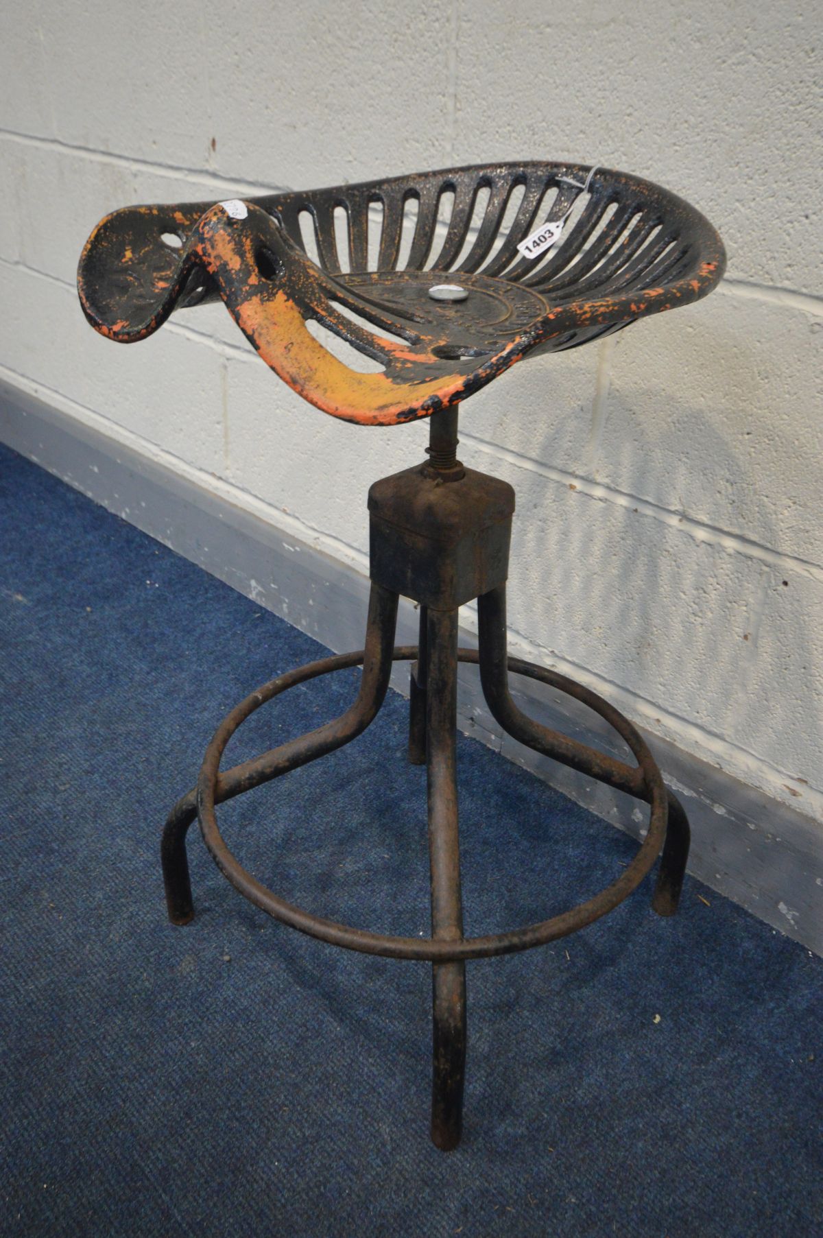 A METAL SWIVEL STOOL, the tractor seat marked Walter A Wood, on a matched tubular base, height 71cm - Image 3 of 3