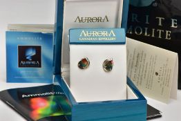 A PAIR OF WHITE METAL AMMOLITE SET EARRINGS, each of a tear drop shape, set with a tear drop shape