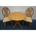 A BEECH DROP LEAF KITCHEN PEDESTAL TABLE, open diameter 92cm x height 73cm and two chairs (3)