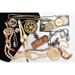 A BAG OF ASSORTED ITEMS, to include a brass ornament fitted to a wooden plinth, imitation pearl
