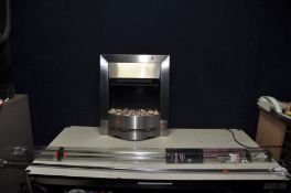 A MODERN DIMPLEX ELD 20 FIRE EFFECT HEATER with pebbles for coals and stainless steel