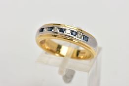 AN 18CT GOLD DIAMOND AND SAPPHIRE HALF ETERNITY RING, designed with a row of five circular cut