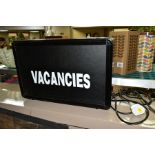 AN ELECTRIC VACANCIES/NO VACANCIES ILLUMINATED SIGN, the fibre optic display has scrolling