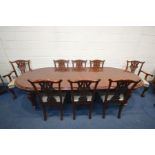 A GOOD QUALITY REPRODUCTION VICTORIAN STYLE MAHOGANY WIND OUT DINING TABLE, with rounded ends, on