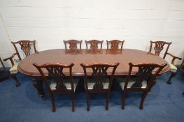 A GOOD QUALITY REPRODUCTION VICTORIAN STYLE MAHOGANY WIND OUT DINING TABLE, with rounded ends, on