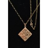 A 9CT GOLD LOCKET PENDANT NECKLACE, the locket of a square form, decorative floral design,