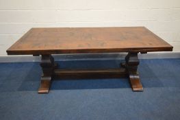 AN IMPRESSIVE 17TH CENTURY STYLE OAK FARMHOUSE TABLE, with draw out leaves to each end, plank top,