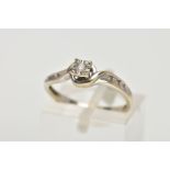 A 9CT GOLD DIAMOND RING, designed with a single round brilliant cut diamond, within a square