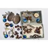 A BAG OF ASSORTED ITEMS, to include white metal and enamel buttons, two white metal initial