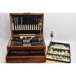 A LARGE WOODEN CANTEEN OF CUTLERY AND A CASED SET OF UNMATCHED CUTLERY, the near complete wooden