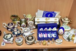 A COLLECTION OF TEN RESIN MINIATURE TEAPOTS, SWAROVSKI CRYSTAL AND OTHER DECORATIVE ITEMS, including