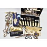 A BOX OF ASSORTED CUTLERY AND ITEMS, to include a pair of George III, bright cut sugar tongs,