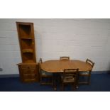 A MODERN OAK PRIORY EXTENDING DINING TABLE with a fold out leaf, extended length 166cm x closed