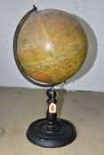 A GEOGRAPHIA TERRESTRIAL GLOBE, diameter 25.5cm, dated 1923, on a wooden stand, height approximately