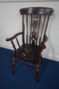 A MODERN STAINED BEECH WINDSOR ARMCHAIR