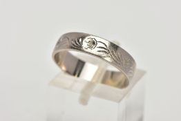 AN 18CT WHITE GOLD WEDDING BAND, engraved floral design, hallmarked 18ct gold Birmingham, ring