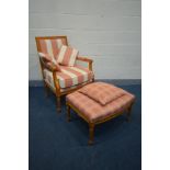A BEECH LOUIS XVI STYLE ARMCHAIR with stripped upholstery, a matching framed footstool with tartan