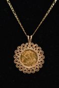 A HALF SOVEREIGN PENDANT AND CHAIN, the 1982 half sovereign within a scalloped 9ct gold mount