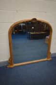 A PINE OVERMANTEL MIRROR, with acanthus leaf pediment,134cm x 119cm