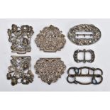 THREE SILVER BUCKLES AND TWO OTHERS, the first of an openwork floral design, hallmarked 'William