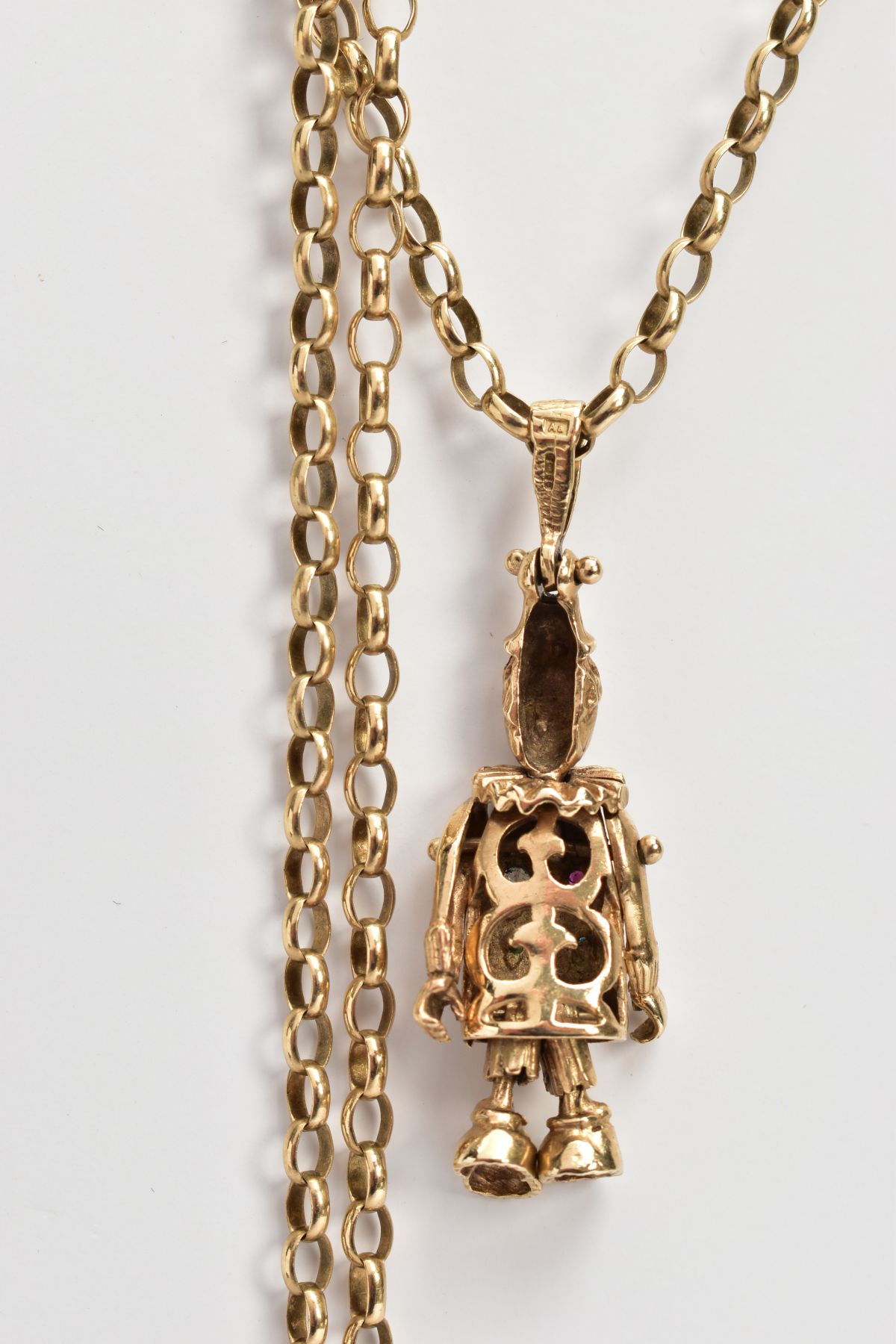 A 9CT GOLD CLOWN PENDANT AND CHAIN, the articulated clown set with four stones to the body, fitted - Image 4 of 4