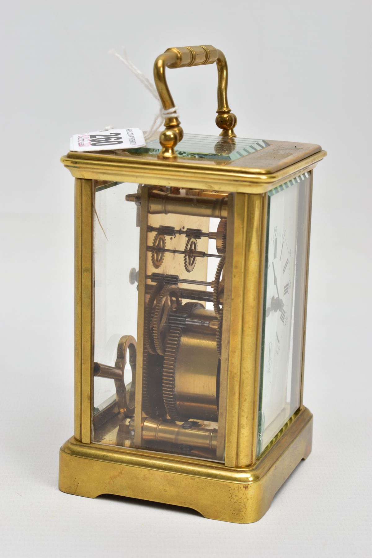 A BRASS CARRIAGE CLOCK, white dial, Roman numerals, blue hands, within a five glass panel - Image 2 of 6