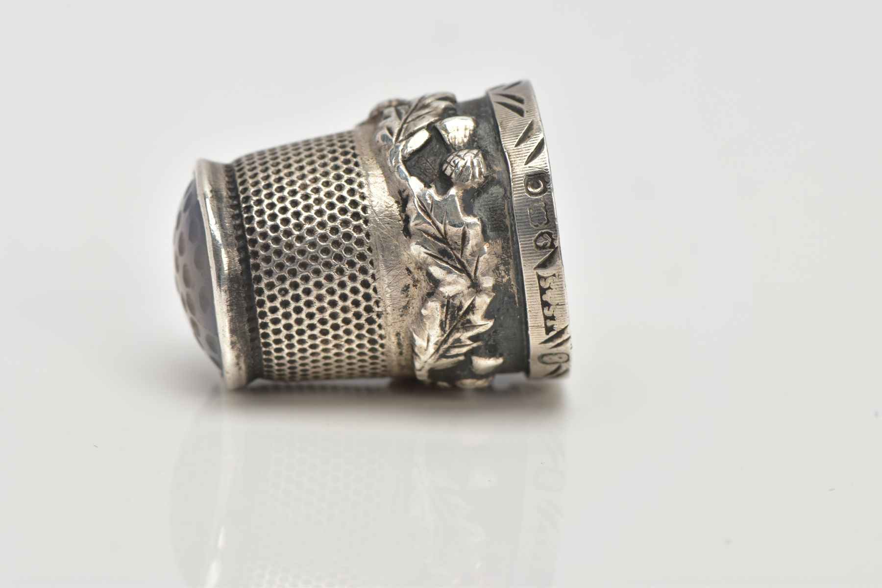 A SILVER THIMBLE, decorated with thistles and set with a possibly chalcedony terminal, hallmarked ' - Image 4 of 4