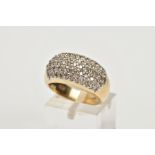 A 9CT GOLD DIAMOND ENCRUSTED CLUSTER RING, wide band with the ring head encrusted with round