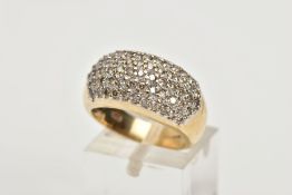 A 9CT GOLD DIAMOND ENCRUSTED CLUSTER RING, wide band with the ring head encrusted with round