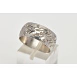 A PLATINUM WIDE BAND, engraved star design, approximate width 8.9mm, hallmarked platinum London,