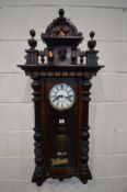 A GUSTAV BECKER WALNUT VIENNA WALL CLOCK height 119cm (winding key and pendulum)