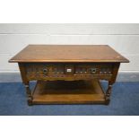 AN OLD CHARM OAK COFFEE TABLE with two drawers, width 92cm x depth 46cm x height 51cm