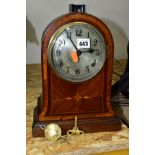 AN EDWARDIAN MAHOGANY AND INLAID MANTEL CLOCK, circular silvered dial with Arabic numerals, eight