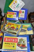 A BOX OF BAYKO BUILDING SET ITEMS to include four boxes, contents not checked but incomplete,