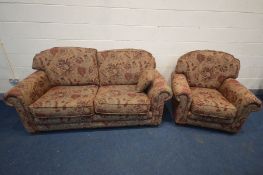 A FLORAL UPHOLSTERED WITH A BROWN FIELD TWO PIECE LOUNGE SUITE, comprising a two seater settee,